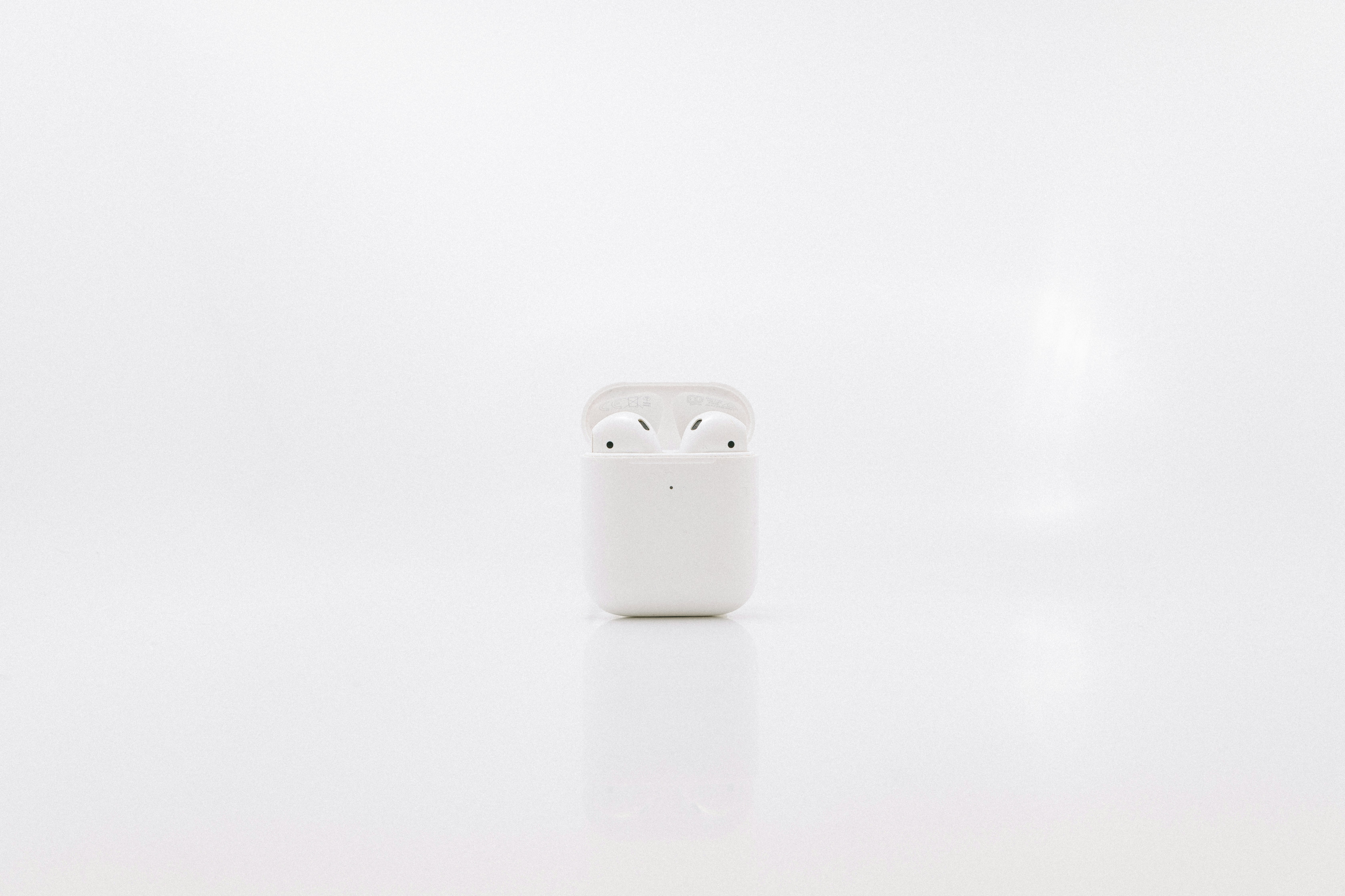 white apple airpods charging case